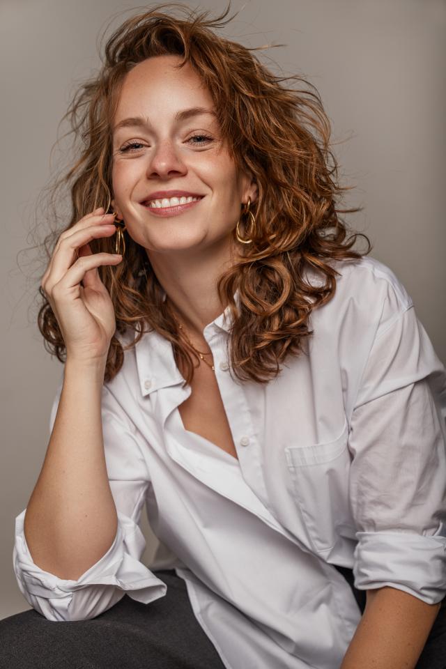 Lisa D. ist ein weibliches Commercials Model mit blau-grünen Augen und rot-blonden Haaren aus München