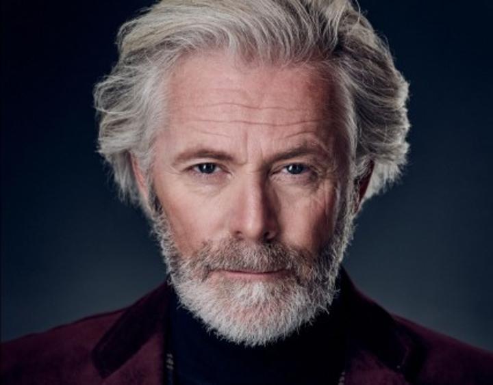 Andreas K. ist ein männliches Best Ager Model mit grün-braunen Augen und grauen Haaren aus München